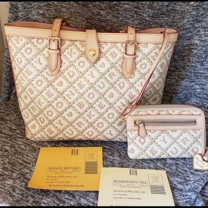 Dooney & Bourke East West Coated Canvas Signature leather Strap Bucket Tote